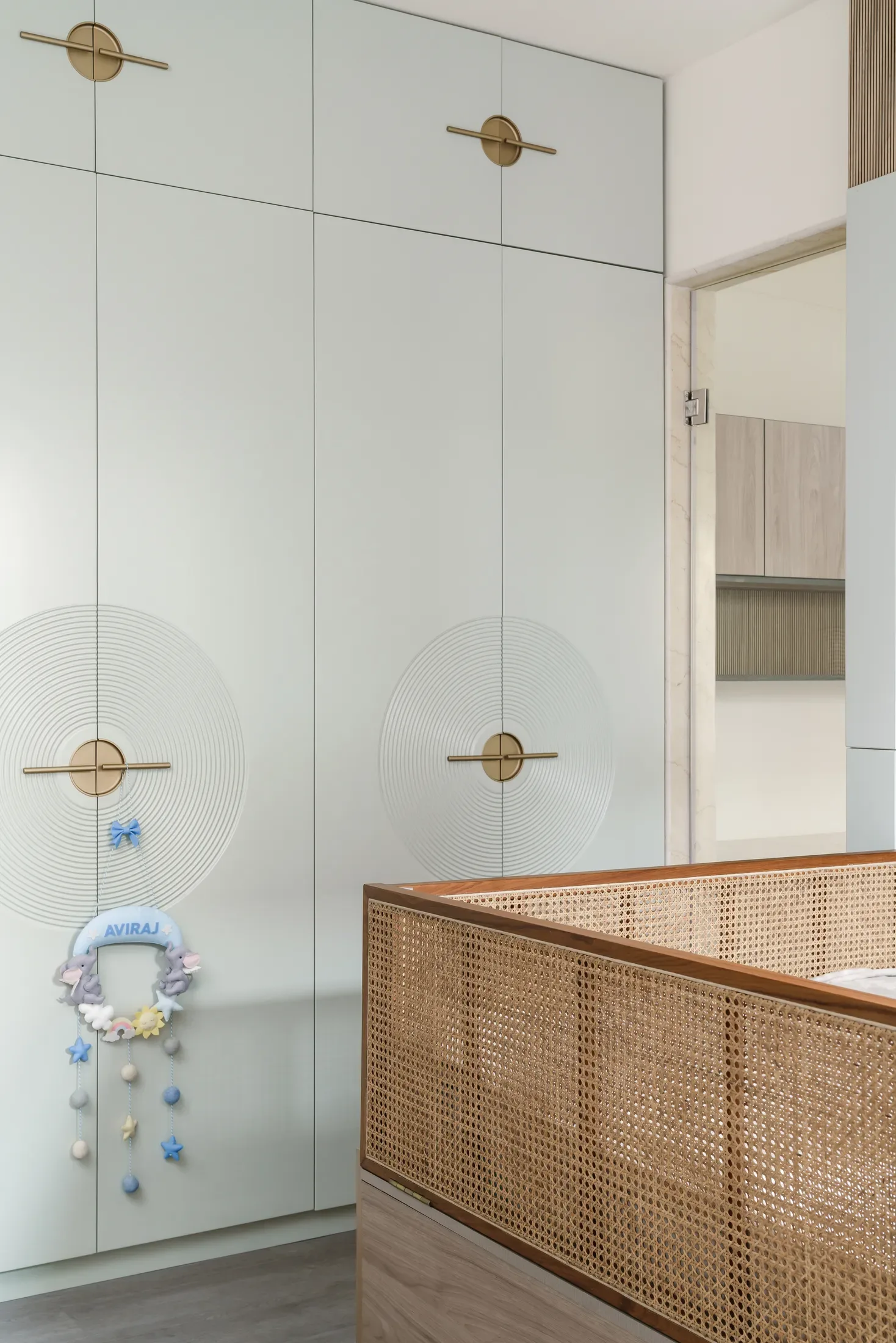 Fluted wardrobe with cane detailing