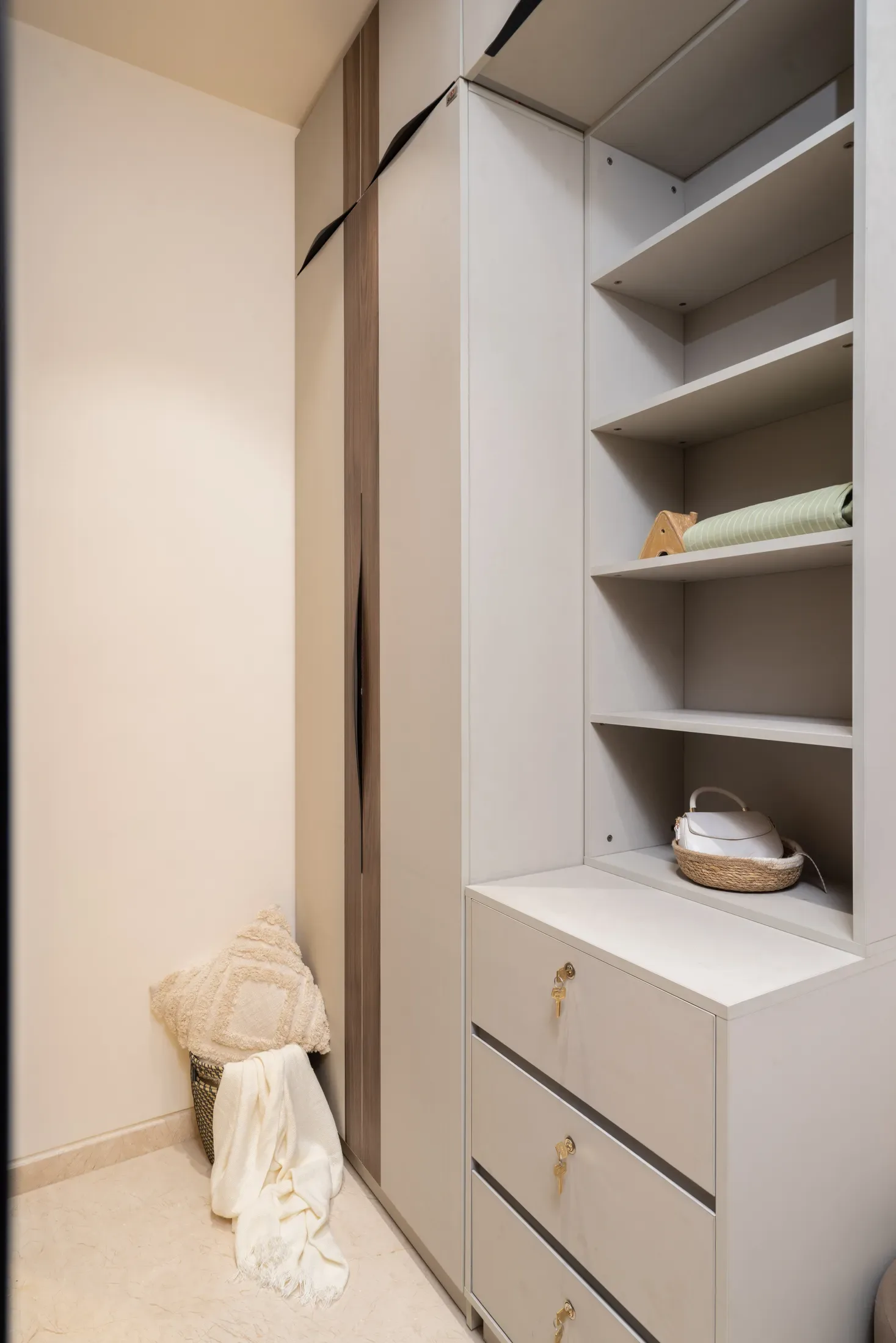 Bedroom with an upholstered headboard and shelf niche